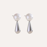 Load image into Gallery viewer, Earrings Lumi Drop – Teardrop Pearl Studs in Stainless Steel
