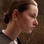 Load image into Gallery viewer, Earrings Lumi Flora – Golden Floral Studs with Zirconia Shine
