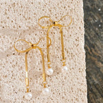 Load image into Gallery viewer, Earrings Liora Bow – Pearl Drop Earrings with Snake Chain Detail
