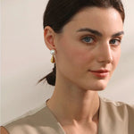 Load image into Gallery viewer, Earrings Lumi Drop – Teardrop Pearl Studs in Stainless Steel
