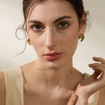 Load image into Gallery viewer, Earrings Fiore Irregular – Sculpted Floral Metal Studs
