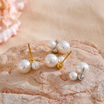 Load image into Gallery viewer, Earrings Lumi Mini – Small Pearl Studs in Gold or Platinum Finish
